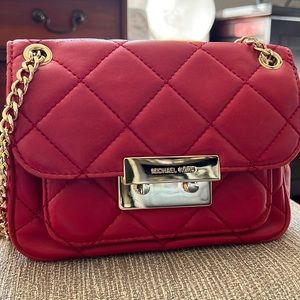 Michael Kors Sloan red quilted leather purse.